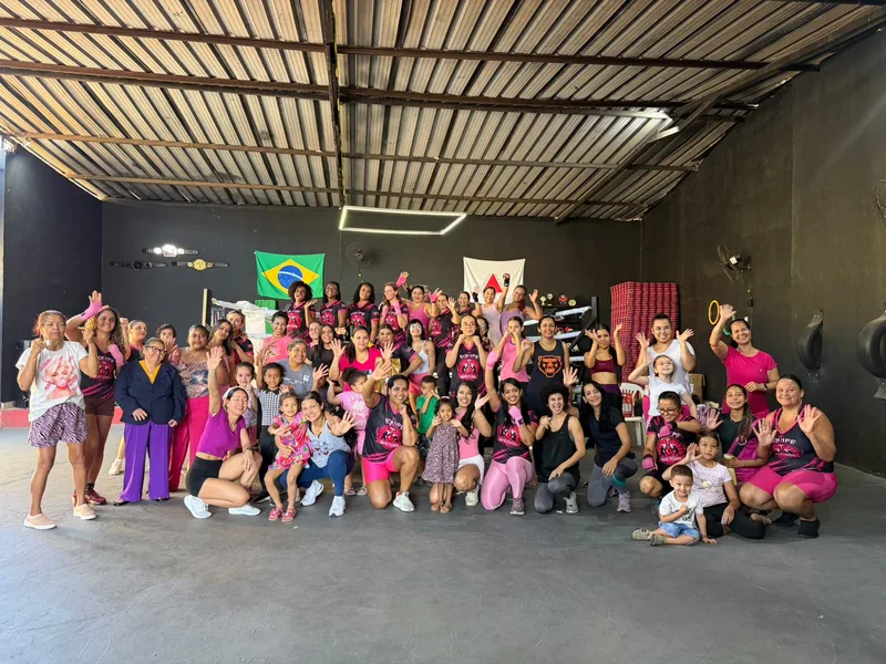 Comunidade da Equipe Novo Tempo reunida no ginásio